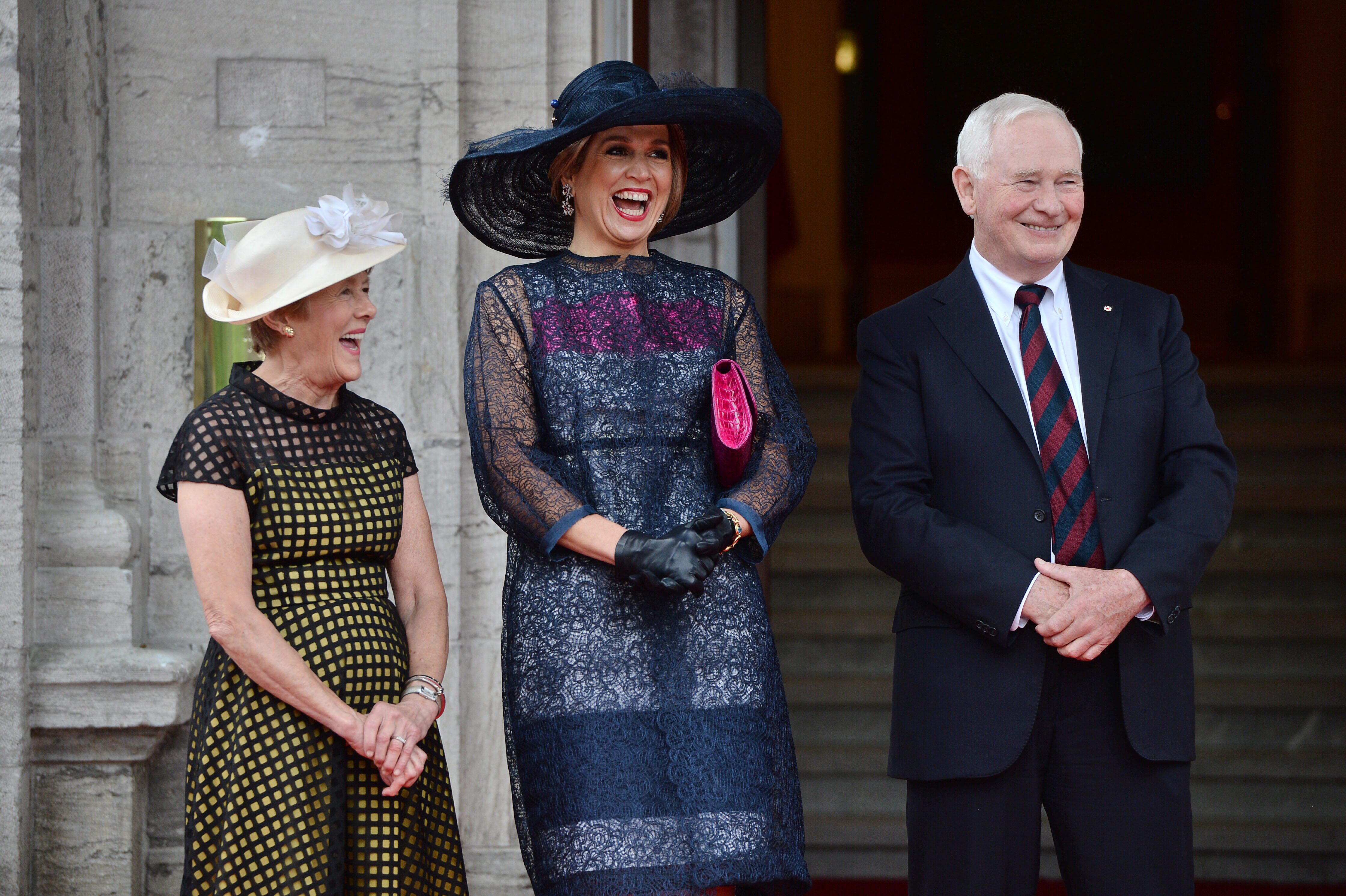 Queen Maxima of the Netherlands, second from left, shares a laugh with Gov.-Gen. David Johnston and his wife Sharon at Rideau Hall in Ottawa on Wednesday, May 27, 2015.  (Sean Kilpatrick/The Canadian Press via AP) MANDATORY CREDIT