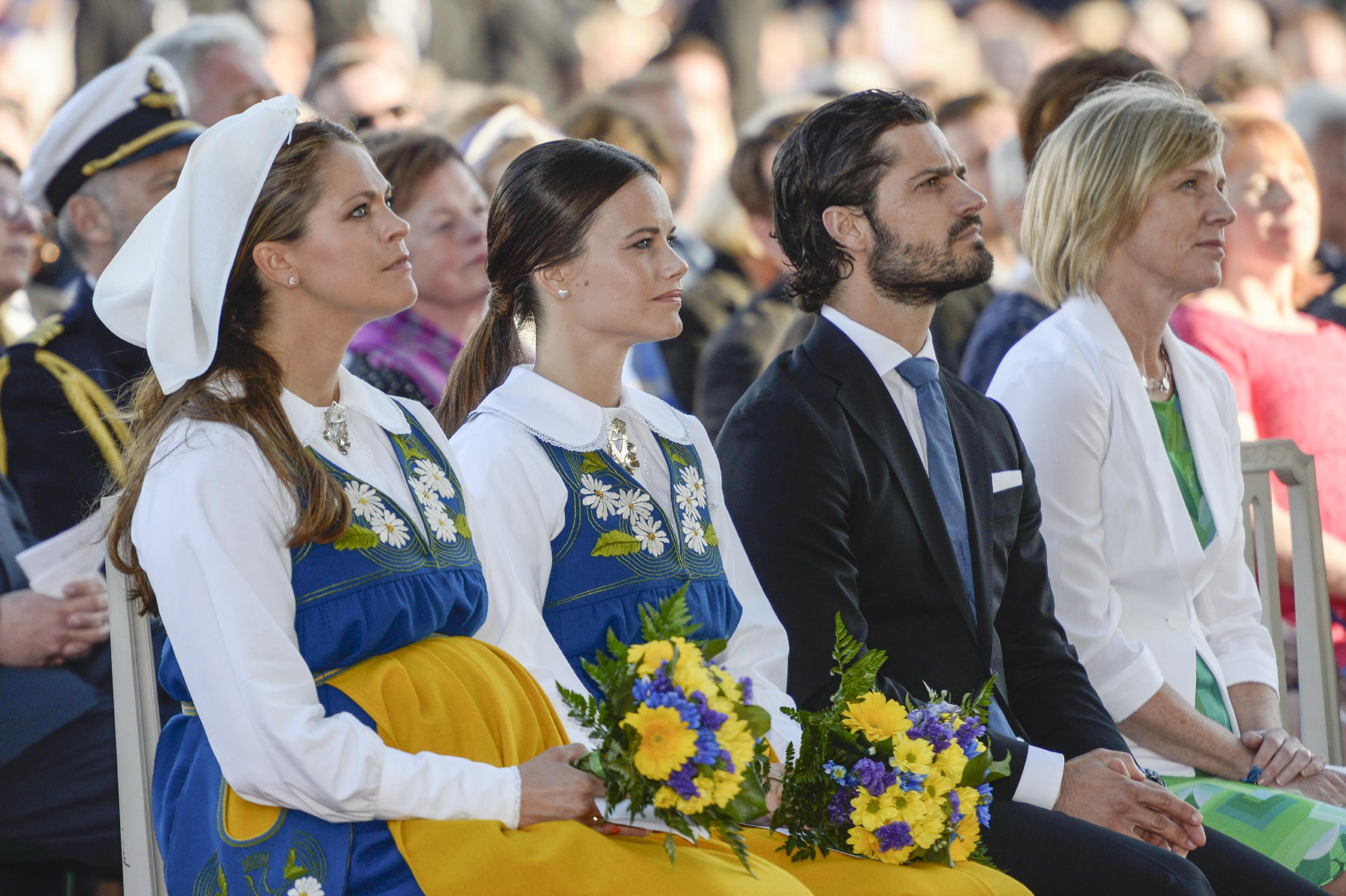From left: Sweden's Princess Madeleine, Sofia Hellqvist and her husband, soon-to-be Prince Carl Philip, and wife of Parliamentary speaker, Jenni Ahlin  during National Day of Sweden celebrations in Stockholm Saturday June 6, 2015. (Janerik Henriksson/TT via AP)   SWEDEN OUT