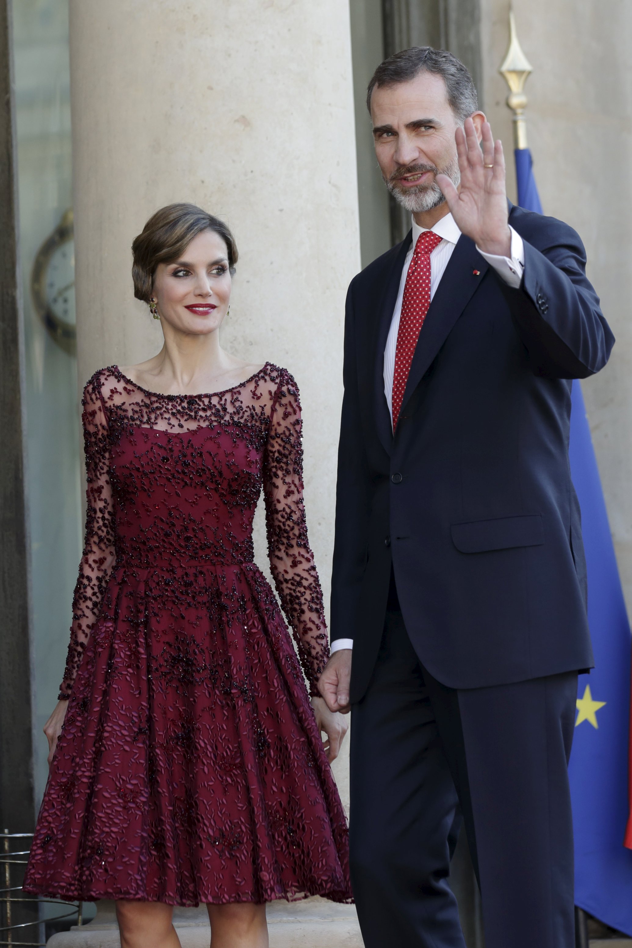 Spain's King Felipe VI and Queen Letizia arrive for a state dinner at the Elysee Palace in Paris, France