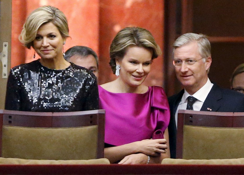 Belgium's King Philippe and Queen Mathilde pose with Netherlands' Queen Maxima at the Bozar concert hall in Brussels