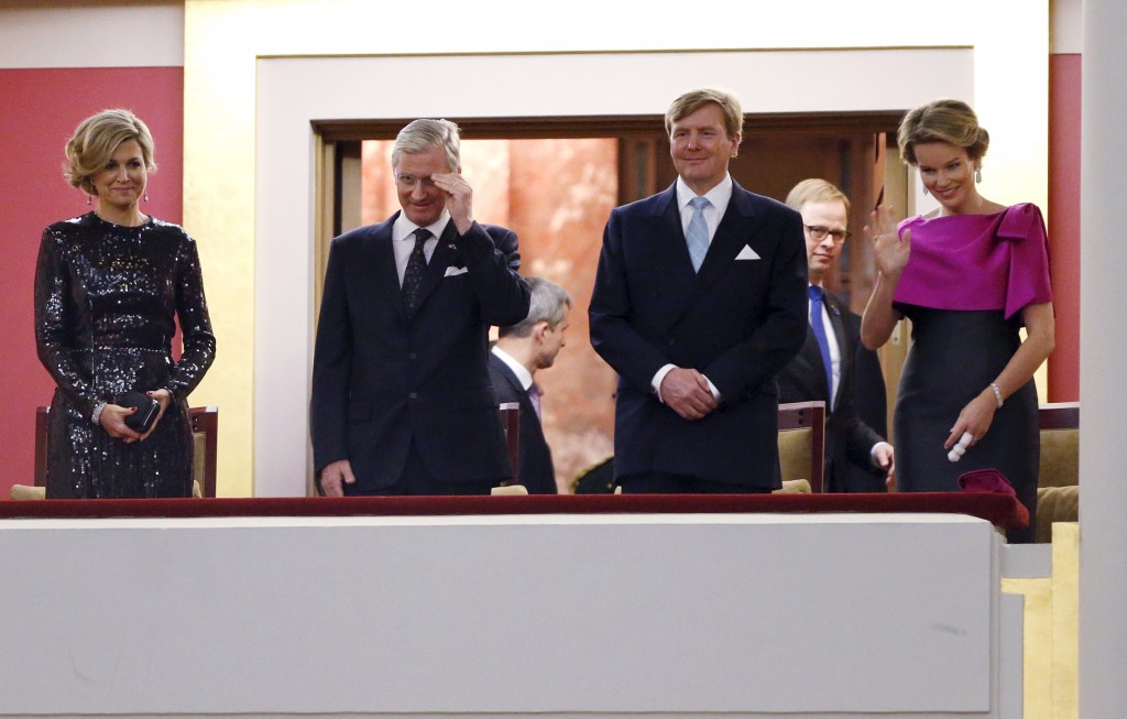 Belgium's King Philippe and Queen Mathilde pose with Netherlands' Queen Maxima and King Willem-Alexander at the Bozar concert hall in Brussels