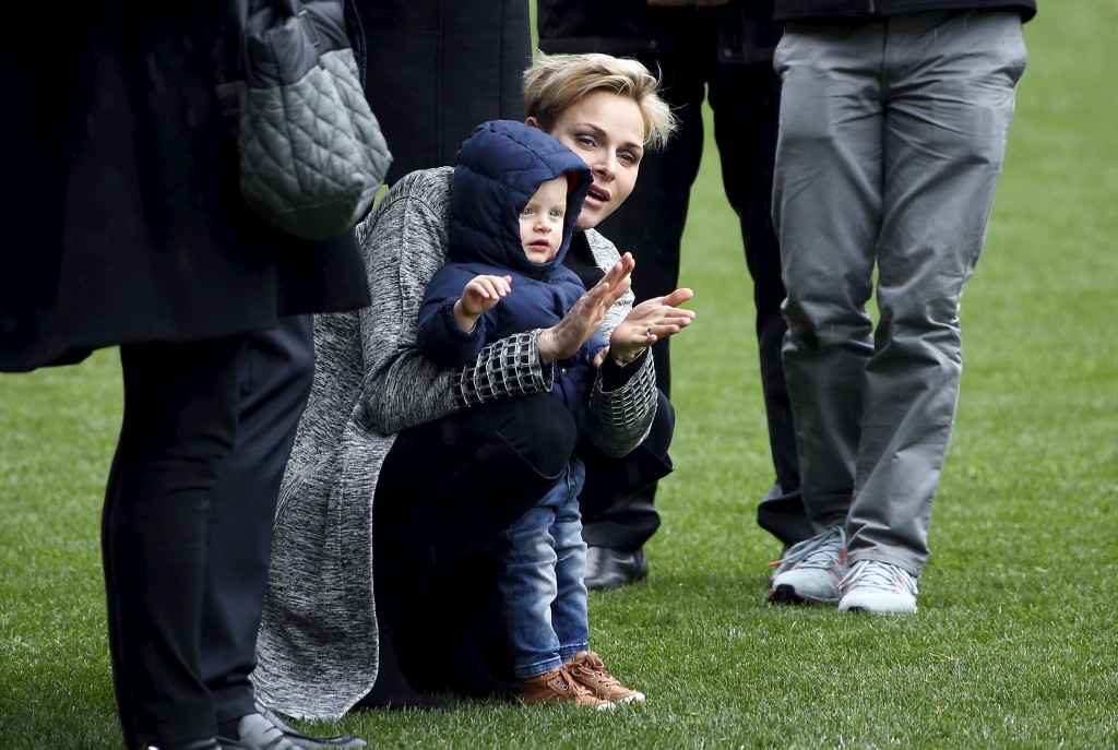 Princess Charlene of Monaco and her son Prince Jacques, attend Sainte Devote rugby tournament at Louis II Stadium in Monaco