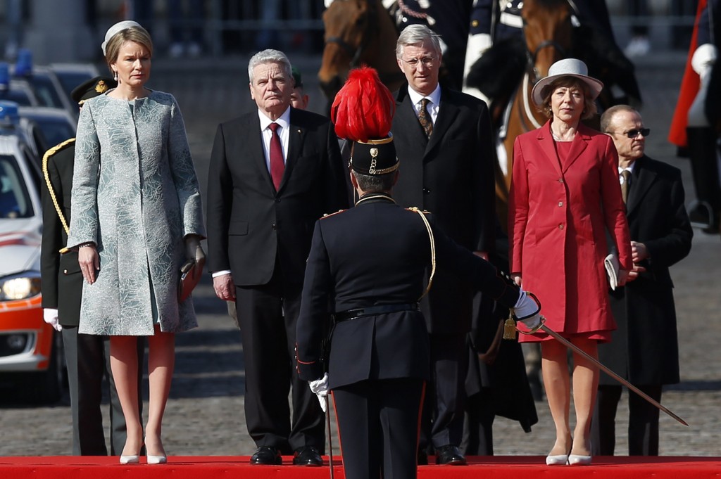 German President Gauck and his partner Schadt pose with Belgium's King Philippe and Queen Mathilde during an official welcoming ceremony in front of the Brussels Royal Palace