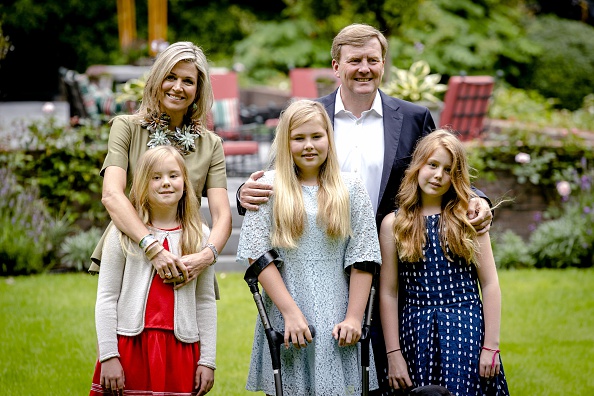 Dutch King Willem Alexander, Queen Maxima and (from L) Princess Ariane, Princess Amalia and Princess Alexia pose during the yearly photo shoot at Wassenaar on July 8, 2016. / AFP / ANP / Sander Koning / Netherlands OUT (Photo credit should read SANDER KONING/AFP/Getty Images)